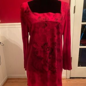 Long red New Directions tunic top embellished with black design. Size L
